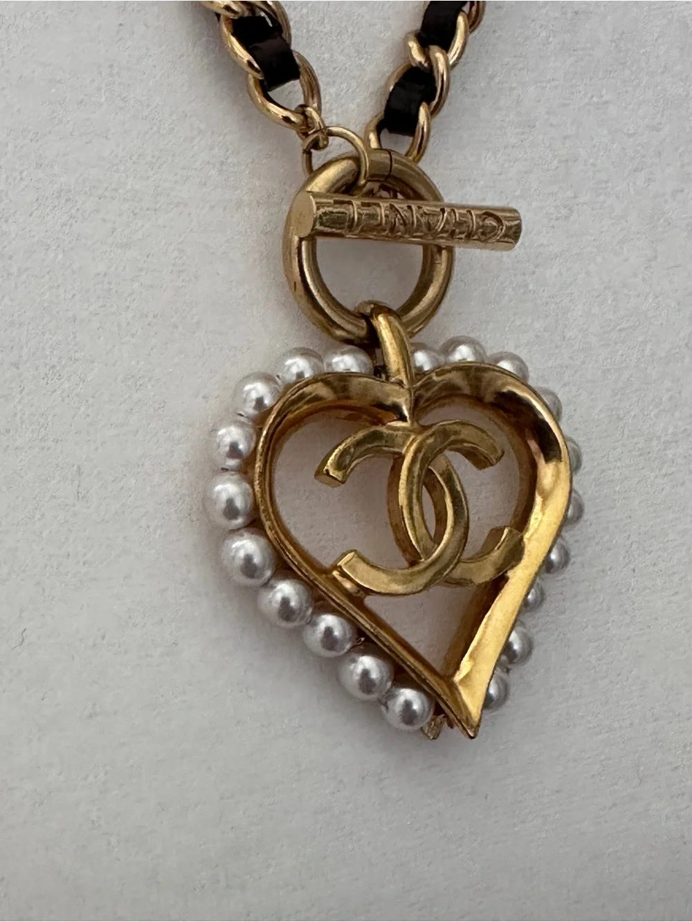 CHANEL Gold and Black Heart CC Pendant Necklace with Pearls